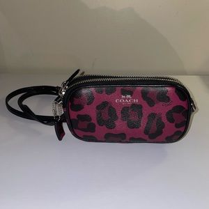 COACH Ocelot Print Crossbody Pouch Coated
Canvas Cranberry